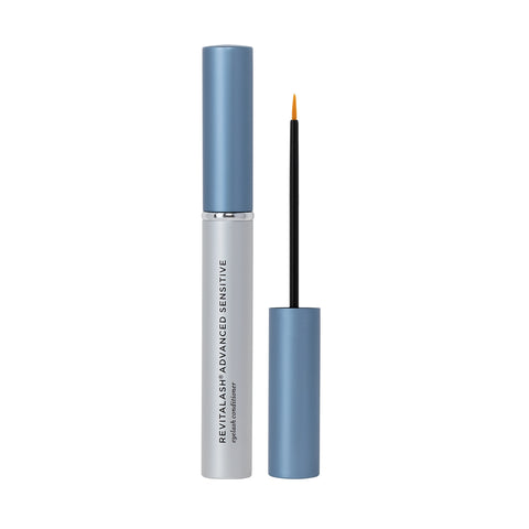 A tube of RevitaLash Advanced Eyelash Conditioner and Enhancing Serum Sensitive (2.0mL 3 Mo.Supply) with the cap off reveals a thin wand and precise applicator tip. Its sleek design includes a metallic blue cap and white body featuring the product name, ideal for sensitive lashes.