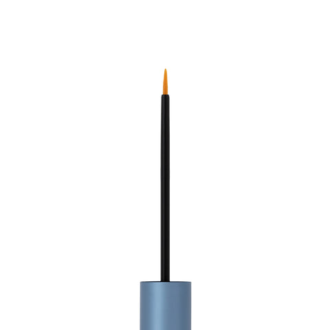 A close-up of a blue eyeliner brush with a fine orange tip stands upright against a white background, ideal for precise application, complementing any eyelash health routine and pairing seamlessly with RevitaLash Advanced Eyelash Conditioner and Enhancing Serum Sensitive (2.0mL 3 Mo. Supply).