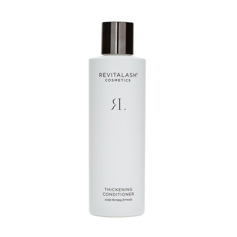 The RevitaLash Cosmetics Thickening Conditioner (250mL) features a white bottle with a black cap, displaying the brand logo and Scalp Therapy Formula. This hypoallergenic blend nourishes your hair, making each strand revitalized and full-bodied.