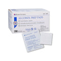 The MedPharma USA Alcohol Prep Pads, labeled in English, Spanish, and French, contain sterile pads infused with isopropyl alcohol for effective sanitization. The box has 100 large pads and features a clean white background.