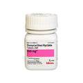 A white plastic bottle from MedPharma USA contains 50 prescription-only Doxycycline tablets, 100 mg each, with a broad-spectrum antibiotic for treating bacterial infections and a pink label.