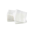 Neatly arranged on a plain white background, stacks of MedPharma USAs 2 x 2, 12-ply non-sterile gauze pads, essential for wound care, are displayed in pristine white. Each box contains 200 pads.