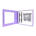 The Merakim Eyes on Beauty Lashes kit, an alternative to extensions, comes in a sleek purple box with faux mink lashes and two black eyeliners on the right, plus a mirror on the left for flawless application.